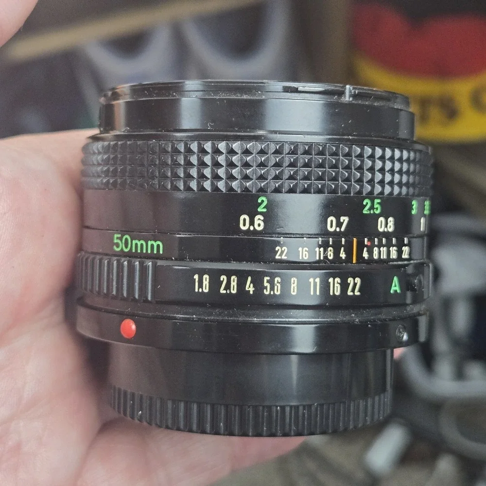 Canon AE-1 35mm SLR Film Camera w Canon 50mm f/1.8 FD Lens + Tons of Extras VID!